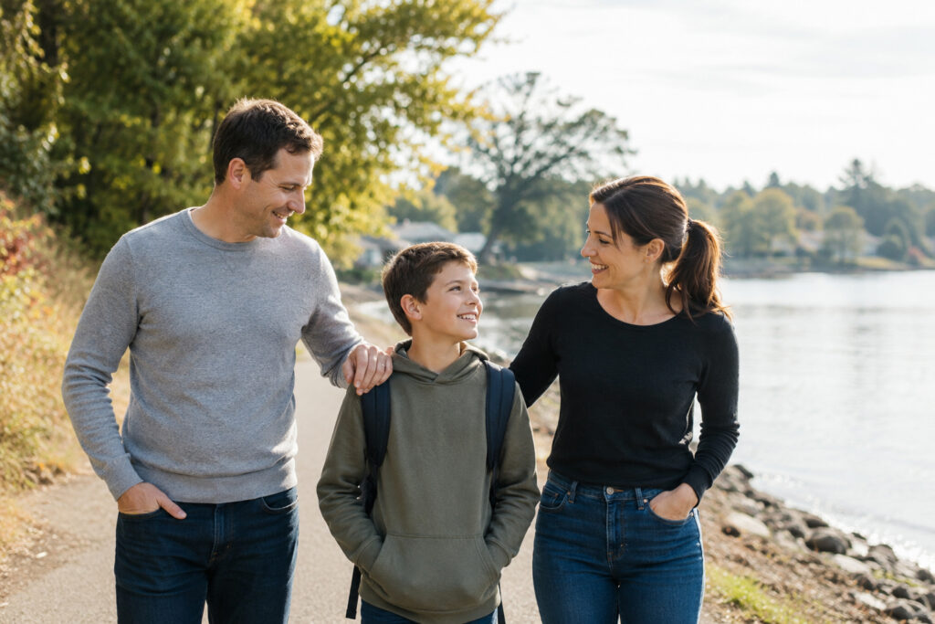 Divorced parents spending positive time with their child while building a healthy co-parenting relationship